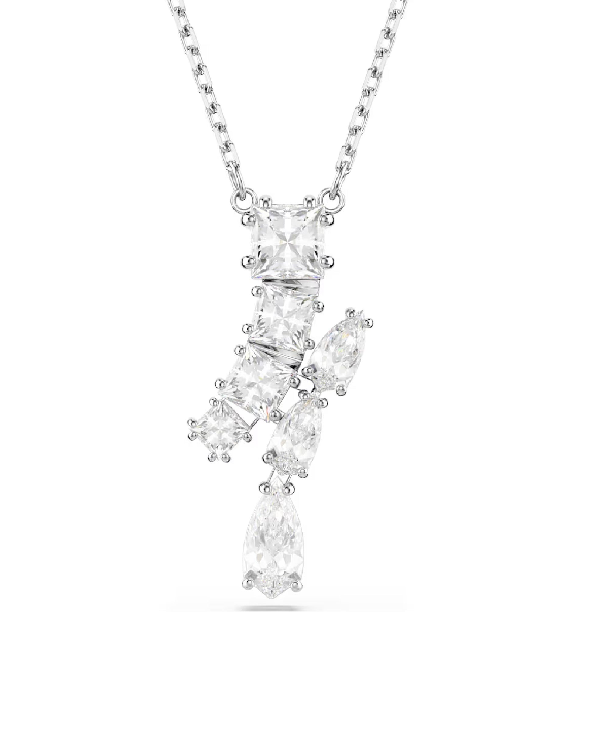 This exquisite Matrix pendant is a stunning example of Swarovski’s mastery of cut. Suspended from an elegant chain with a lobster closure, the rhodium plated jewelry is precisely arranged with an array of prong-set Swarovski Zirconia in different shapes. Pair with a set of matching earrings to create a light-filled look